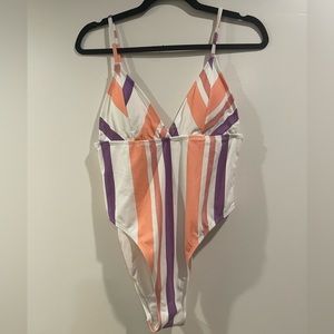 Luminescent V-Neck Paneled Stripes One-Piece Swimsuit